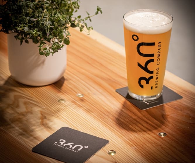 360 branded glass and beer mat