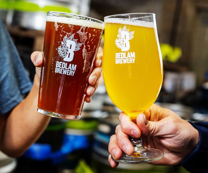 branded bedlam beer glasses